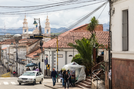SUCRE, BOLIWIA - FEBRUARY 08, 2018: Street in Sucre. Sucre is the constitutional capital of Bolivia. Traditional colonial architecture, white houses.のeditorial素材