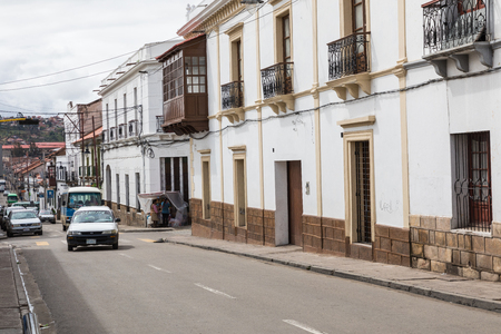 SUCRE, BOLIWIA - FEBRUARY 08, 2018: Street in Sucre. Sucre is the constitutional capital of Bolivia. Traditional colonial architecture, white houses.のeditorial素材