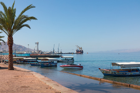 AQABA, JORDAN - MARCH 19, 2018: Touristic ships on the beach of Aqaba, Jordan. Popular resort, located at the north of the Red Sea.のeditorial素材