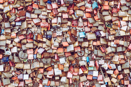 COLOGNE, GERMANY - FEBRUARY 19, 2018: Thousands of love locks which sweethearts lock to the Hohenzollern Bridge to symbolize their love on August 26 in Koln, Germanyのeditorial素材
