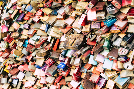 COLOGNE, GERMANY - FEBRUARY 19, 2018: Thousands of love locks which sweethearts lock to the Hohenzollern Bridge to symbolize their love on August 26 in Koln, Germanyのeditorial素材