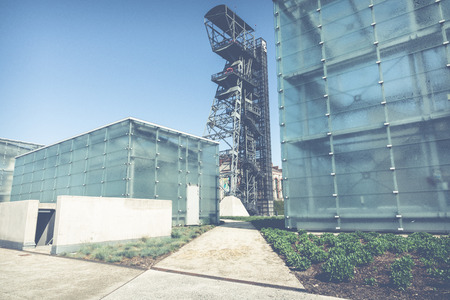 KATOWICE, POLAND - MAY 05, 2018: The modern buildings of Silesian Museum accompanied by a shaft of the former coal mine "Katowice", now adapted as an observation tower.のeditorial素材
