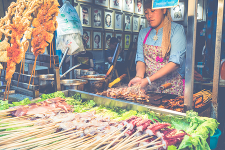 XIAN, CHINA - MAY 23, 2018: Unidentified merchants are selling traditional food in Xian, China.のeditorial素材