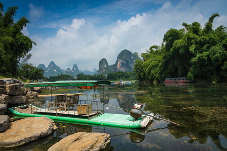 Li River (Lijiang River). Pleasure boats at the pier in Xingping Townの写真素材