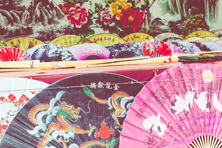Traditional handicraft chinese fans at market in Yangshuo, China.のeditorial素材