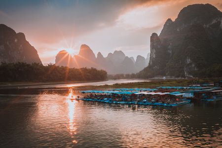 Sunset at Li River, Xingping, Guilin, China. Xingping is a town in North Guangxi, China.のeditorial素材
