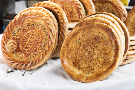 Traditional uzbekistan bread lavash at local bazaar, is a soft flat-bread of Middle Asia (Uzbekistan).の写真素材