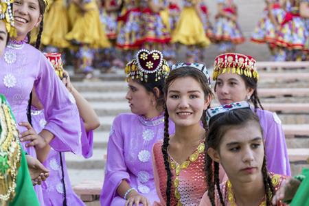 KHIVA, UZBEKISTAN - AUGUST 26, 2018: Folk dancers performs traditional dance at local festivals.