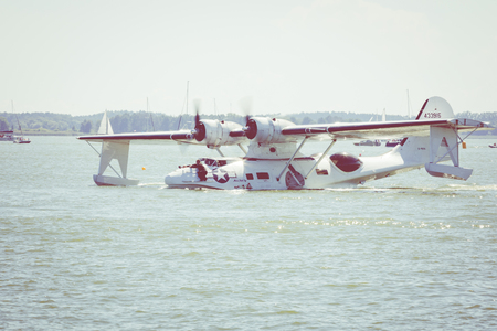 GIZYCKO, POLAND - AUGUST 5, 2018: Flight Boat Consolidated PBY Catalina at Air Show Mazury 2018 event at the lake Niegocin in Gizycko. Poland.のeditorial素材