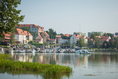 RYN, WARMIA-MASURIA PROVINCE / POLAND - JULY 31, 2018: Marina and pier on Rynskie lake, town of Ryn.
