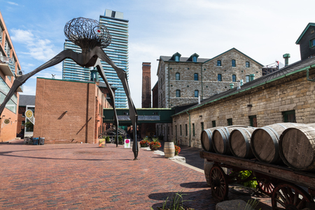 TORONTO, CANADA - SEPTEMBER 18, 2018: Distillery District (former Gooderham & Worts Distillery) - historic and entertainment precinct. It contains numerous cafes, restaurants, shops and industrial parts.のeditorial素材