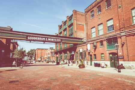 TORONTO, CANADA - SEPTEMBER 18, 2018: Distillery District (former Gooderham & Worts Distillery) - historic and entertainment precinct. It contains numerous cafes, restaurants, shops and industrial parts.のeditorial素材