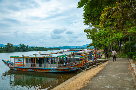 HUE, VIETNAM - NOVEMBER 19, 2018: Traditional Dragon Boat on the Perfume River in Hue, Vietnam. Popular tourist attraction.のeditorial素材
