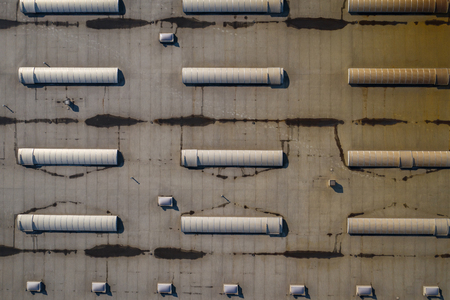 Disribution warehouse roof from above. Photo captured with drone.の写真素材
