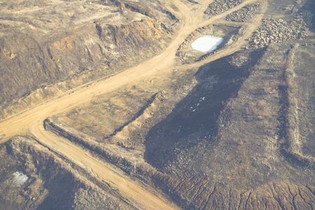 Aerial view of sandpit and factory plant producing sand materials for construction industry. Top...