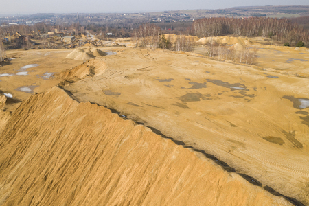 Aerial view of sandpit and factory plant producing sand materials for construction industry. Top...