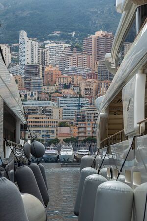 LA CONDAMINE, MONACO - JUNE 04, 2019: Yachts docked at Port Hercules in La Condamine harbour....