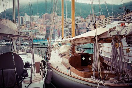 LA CONDAMINE, MONACO - JUNE 04, 2019: Yachts docked at Port Hercules in La Condamine harbour....