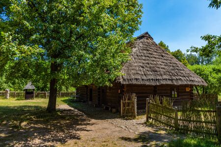 CHORZOW, POLAND - JUNE 27, 2019: Open-air museum in ChorzÃ³w. Wooden cottage in heritage park. Upper Silesian Ethnographic Park in ChorzÃ³w.のeditorial素材