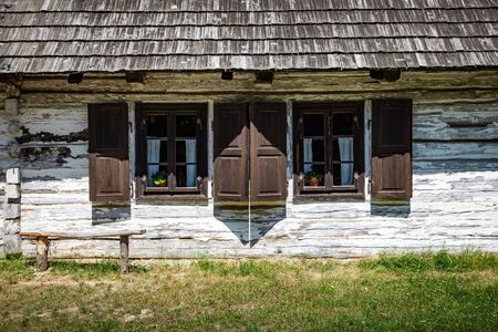 CHORZOW, POLAND - JUNE 27, 2019: Open-air museum in ChorzÃ³w. Wooden cottage in heritage park. Upper Silesian Ethnographic Park in ChorzÃ³w.のeditorial素材