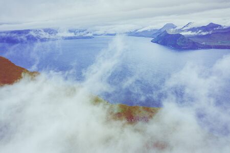 Aerial view of Koltur island in Faroe Islands, North Atlantic Ocean. Photo made by drone from above. Nordic Natural Landscape.の写真素材