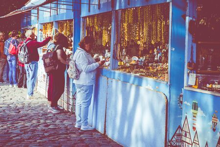 KALININGRAD, RUSSIA - SEPTEMBER 04, 2019: Amber pendants and necklaces at the street market of Curonian Spit, Kaliningrad region, Russia.のeditorial素材