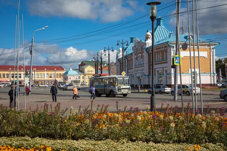 TOMSK, RUSSIA - SEPTEMBER 13, 2019: Urban transport on the road a small street of a provincial Russian city. Siberia. Russia.のeditorial素材