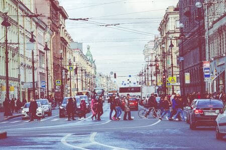 SAINT PETERSBURG, RUSSIA - SEPTEMBER 17, 2019: Street traffic in historic part of city in St.Petersburg, Russia.のeditorial素材