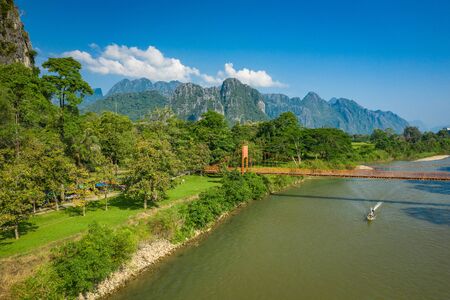 Aerial view of village Vang Vieng and  Nam Song river , Laos. Southeast Asia. Photo made by drone...