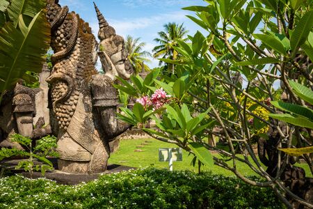 Buddha park Xieng Khouane in Vientiane, Laos. Famous travel tourist landmark of Buddhist stone statues and religious figures.の写真素材