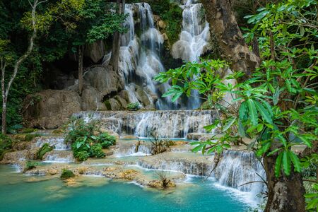 Turquoise water of Kuang Si waterfall, Luang Prabang, Laos. Tropical rainforest. The beauty of nature.の写真素材
