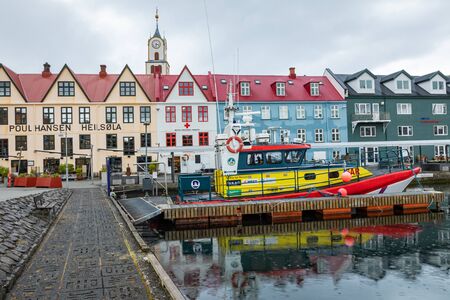 TORSHAVN, FAROE ISLANDS - JULY 05, 2019: Old town of capital city of Torshavn. Typical houses with peat roof ( grass roof ). Faroes Islands. Denmark. Europe.のeditorial素材