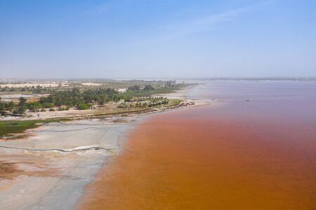 Aerial view of the Pink Lake Retba or Lac Rose in Senegal. Photo made by drone from above. Africa Natural Landscape.の写真素材