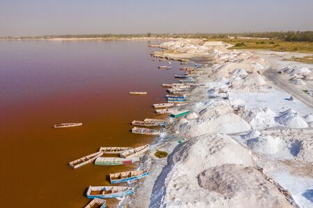 Aerial view of the Pink Lake Retba or Lac Rose in Senegal. Photo made by drone from above. Africa...