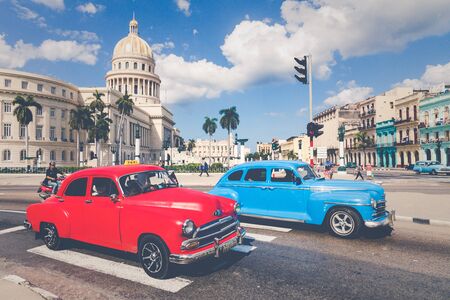 HAVANA, CUBA - DECEMBER 10, 2019: Vintage colored classic american cars in Old Havana, Cuba.のeditorial素材