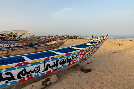 Traditional painted wooden fishing boat in Kayar, Senegal. West Africa.
