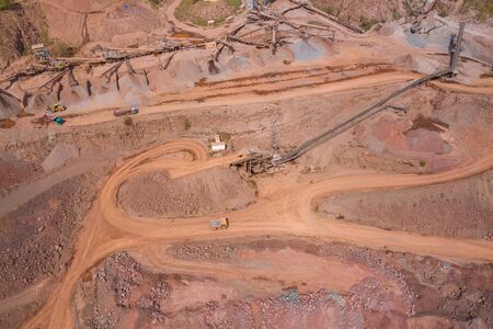 Mining from above. Industrial open pit mineral mine. Aerial view of opencast mining. Mine...