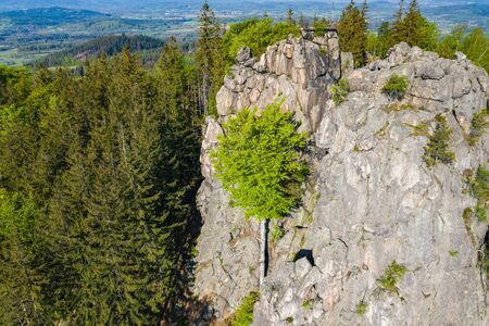 Rudawy Janowickie Landscape Park Aerial View. Rocks Sokoliki, climbing area in mountain range in Sudetes in Poland view with green forests and landscape.の写真素材