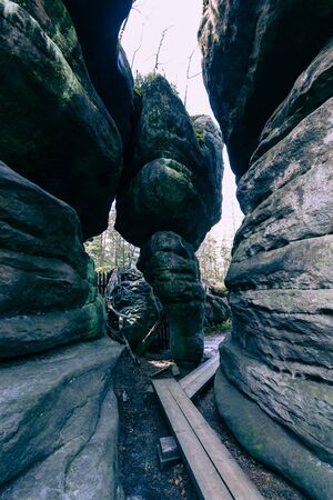 Stolowe Mountains National Park. Path in Rock Labyrinth hiking trail Bledne Skaly. Errant Rocks in Sudetes Mountains near Kudowa-Zdroj, Lower Silesia, Poland.の写真素材