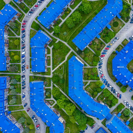 OLKUSZ, POLAND - JUNE 03, 2020: Aerial view of the housing estate with blue roofs. Estate Sloviki located on Witosa street is also called " Smurfs" Olkusz, Poland.のeditorial素材
