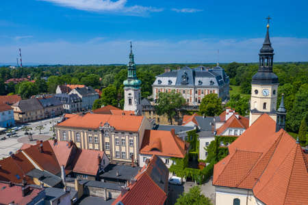 PSZCZYNA, POLAND - JUNE 04, 2020: Aerial view of main market square in historical european city. Colorful old buildings and clear blue sky. Pszczyna, Upper Silesia, Poland.のeditorial素材