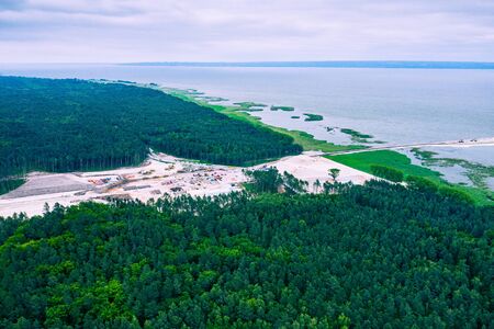 Aerial view of Vistula Spit, place for the future canal. Construction site from above. Poland.