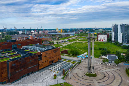 GDANSK, POLAND - JUNE 17, 2020: Aerial view of European Solidarity Center and the monument to the Fallen Shipyard Workers of 1970 with three crosses. Tricity, Pomerania, Poland.のeditorial素材