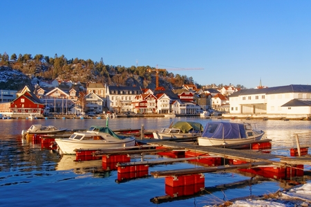 Picturesque scenery of the Kragero town harbour in Norway, Telemark County, HDR technique. Winter...