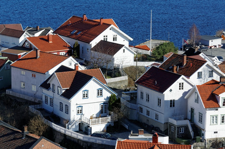 Kragero, Telemark. Norway - February 2015. Colorful wooden buildings, white buildings, red buildings...