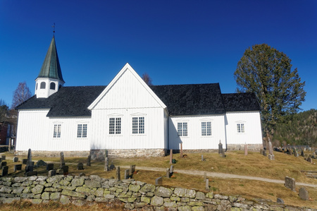 Drangedal, Norway, March 21, 2015: Whitewashed Norwegian churuch located in parish Bamble rural deanery. Cuilding material is tre. Was built in 1775. The church is of cruciform plan and 300 number of seats.のeditorial素材