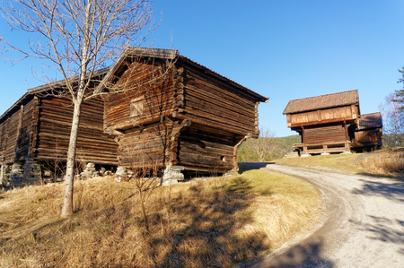 Notodden, Norway, March 21, 2015: Many norway's various buildings  represent farming history. Traditional norwegian old authenti moved farm building. Early spring.のeditorial素材