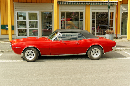 Grimstad, Norway - 1 May 2015: Cream colored Chevrolet at American cars show "AmCar monstring".のeditorial素材