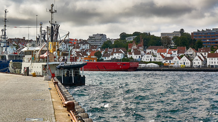 Stavanger, Norway - July 26, 2015:  Cargo ship moored at the quayside in the port Stavanger. Fjord - Boknafjord, county Rogaland region Vestlandet.のeditorial素材