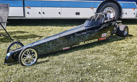 Froya island, Norway - 24 July 2016: Side of the racing car  car in black at cars show in norwegian Islanders Classic Car Club - Kysttreffet 2016.Island in the Atlantic Ocean and Norwegian fjord.のeditorial素材
